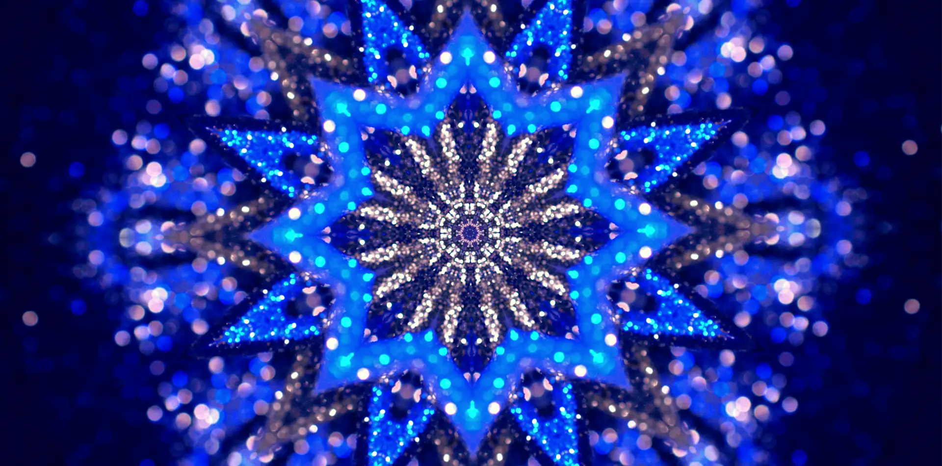 A soft, glowing mandala or energy blue diagram