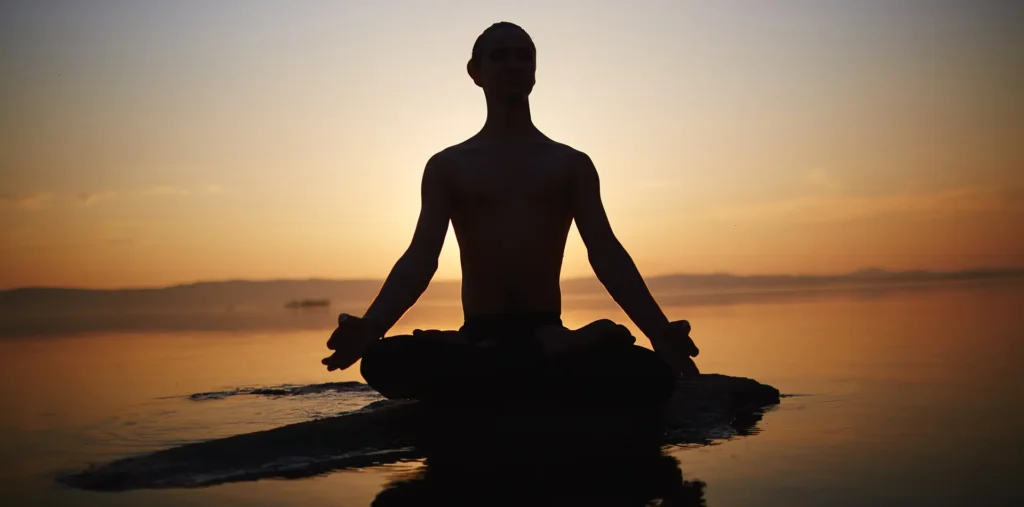 Human consciousness energy field showing chakra colors and spiritual light patterns.