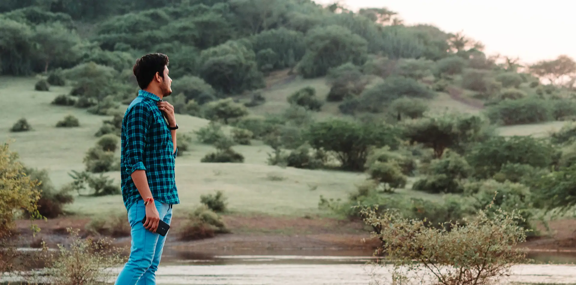 A calm figure in nature representing courage, love, and peace