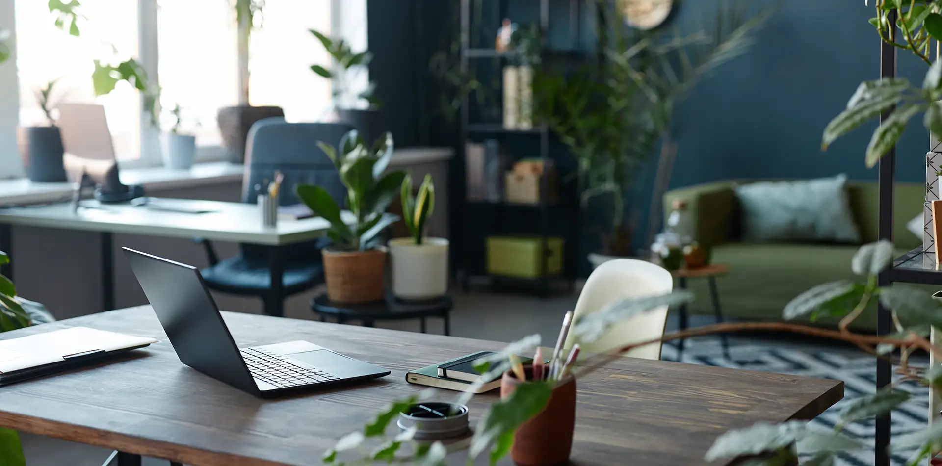 A panoramic view of a bright, serene office environment with natural elements and soft lighting, symbolizing a harmonious balance between professional productivity and spiritual well-being.