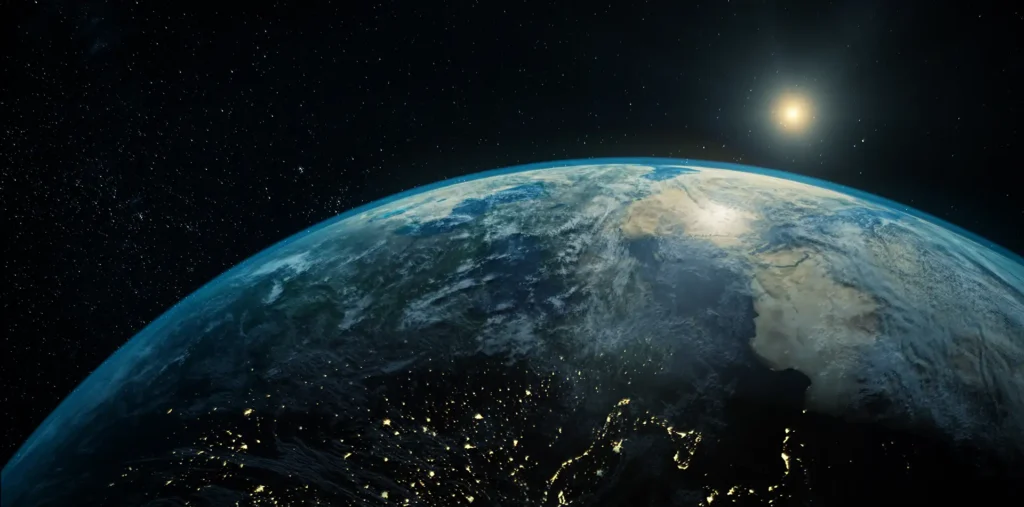 A cinematic panoramic view of Earth from space with a brilliant golden light star and glowing energy trails, symbolizing global peace and spiritual transformation for 2026.