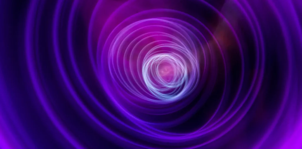 A vibrant spiral of light moving upward, symbolizing the flow of consciousness and innate intelligence.