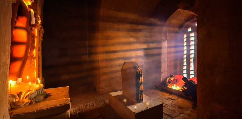 A beam of bright sunlight shines into an empty ancient stone room, showing that the spirit lives on long after the body is gone.