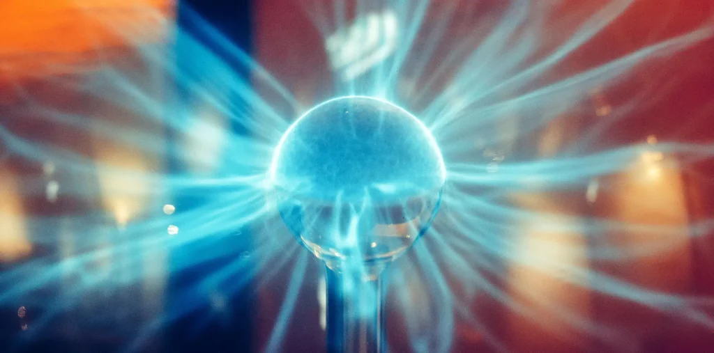 A glowing human heart at the center of a vibrant energy field, symbolizing the power of love and connection.