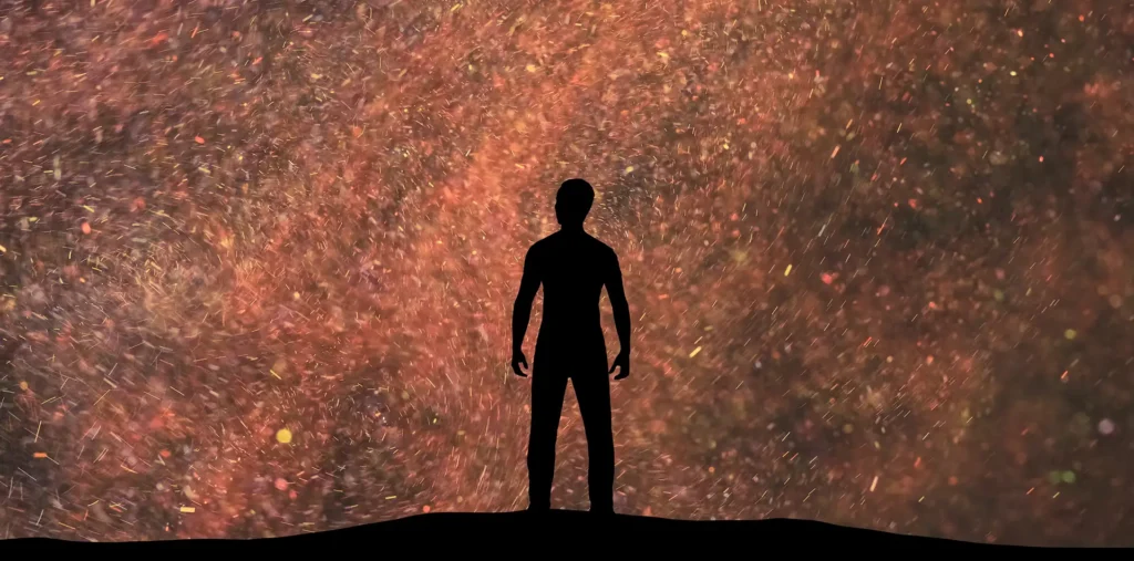 A human silhouette with a radiant, glowing light centered near the navel, representing the core energetic connection to the Divine.