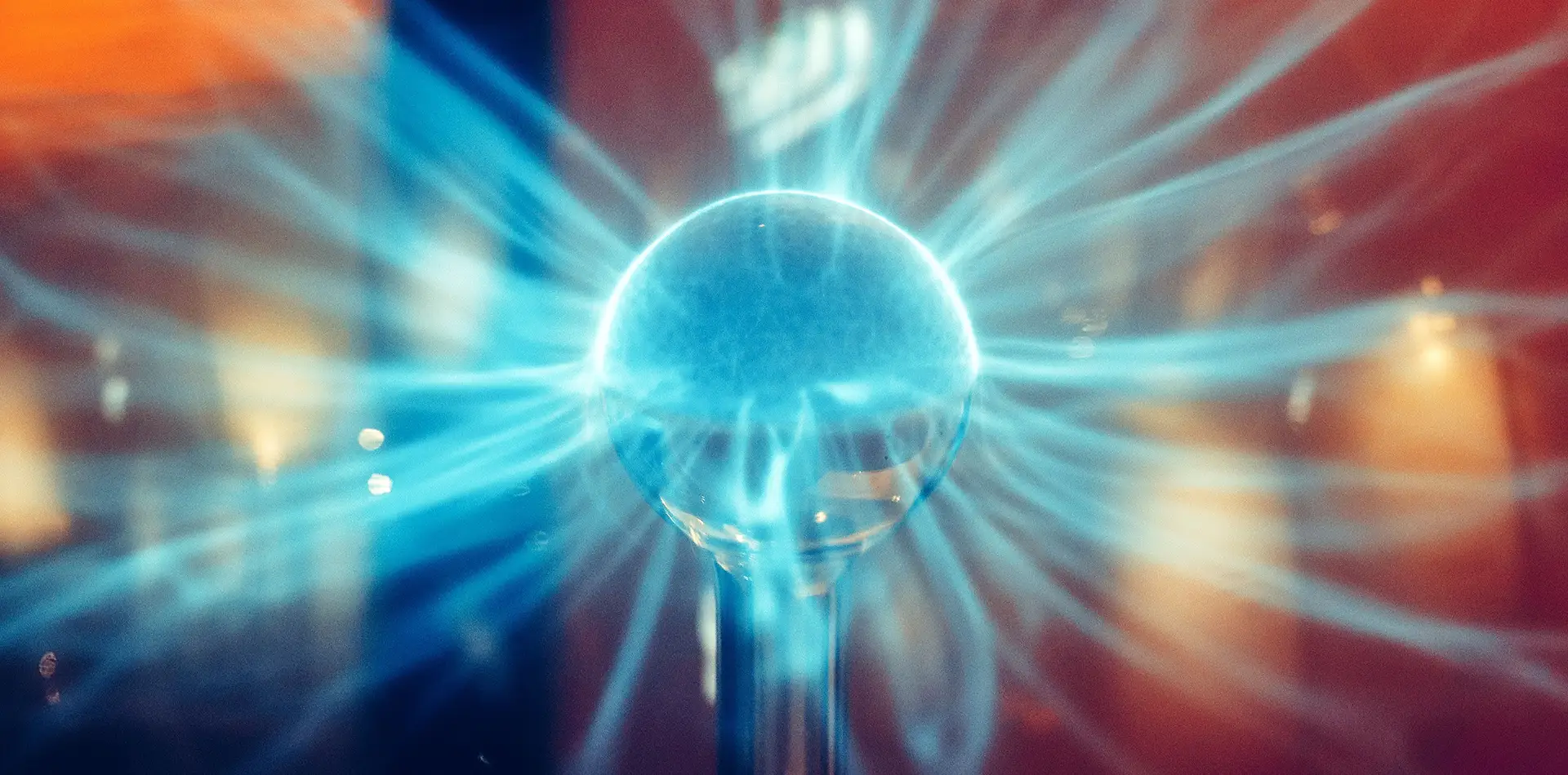 An artistic visualization of human silhouettes connected by vibrant, glowing energy threads, illustrating our collective unity.