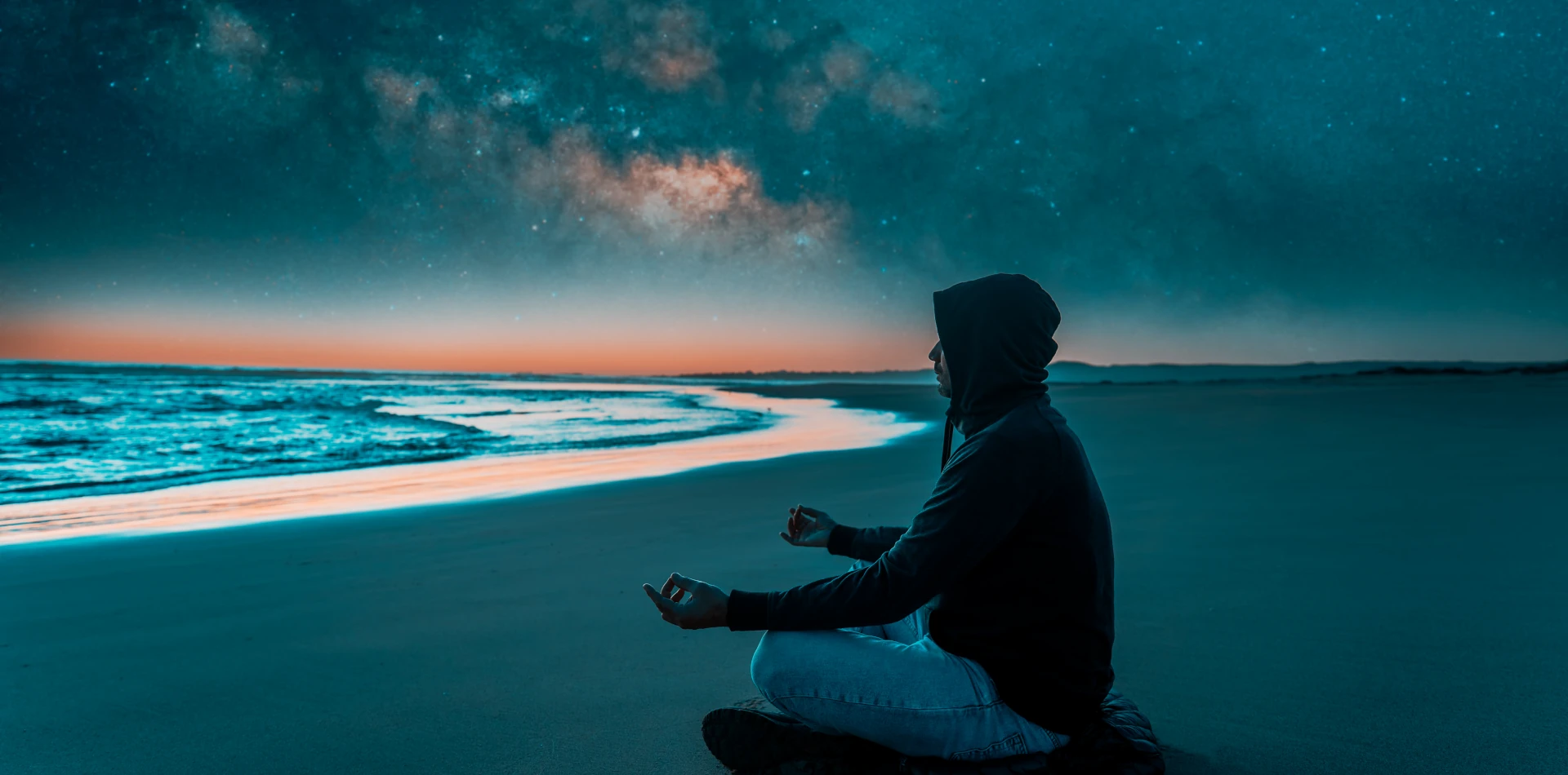 Person meditating in golden light representing conscious awakening and SOL energy alignment