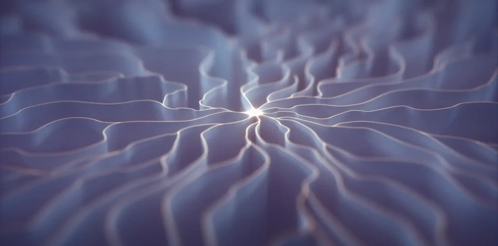 A close-up of a metal plate with sand creating geometric wave patterns, illustrating the physical effect of sound frequency known as cymatics.