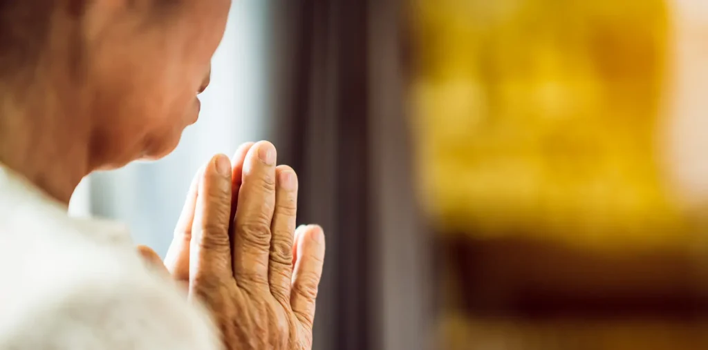 A woman in a warm and emotional moment, reflecting spiritual depth and genuine human connection