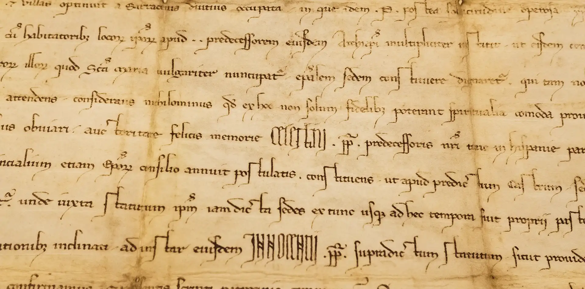 Ancient parchment scrolls by candlelight representing the epistles of Paul of Tarsus