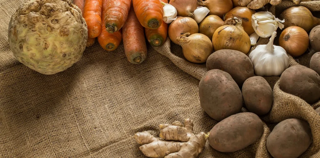 Fresh water and natural harvest of fruit and vegetables in warm earthy tones