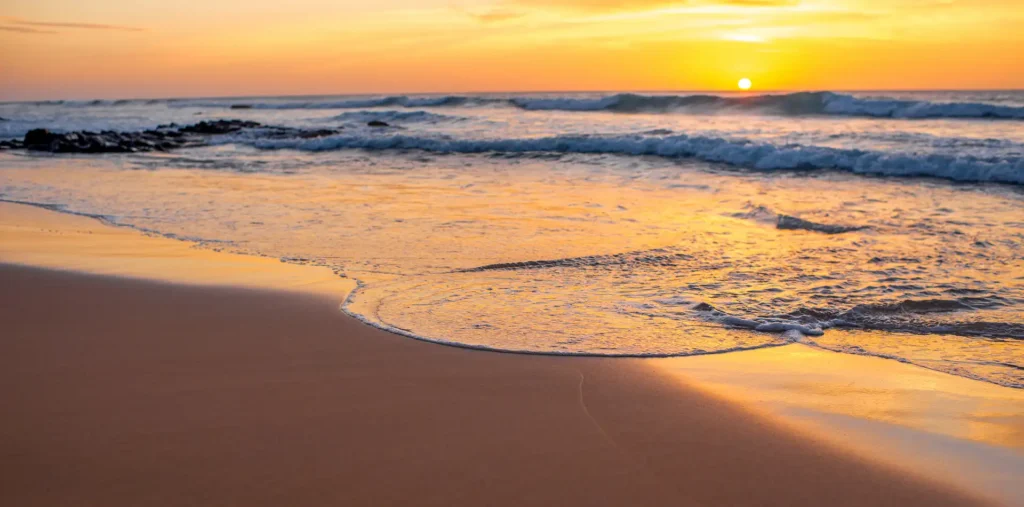 Calm sunrise over a tropical bay representing spirituality through simplicity